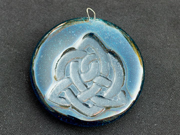Triquetra with Interwoven Heart Medallions